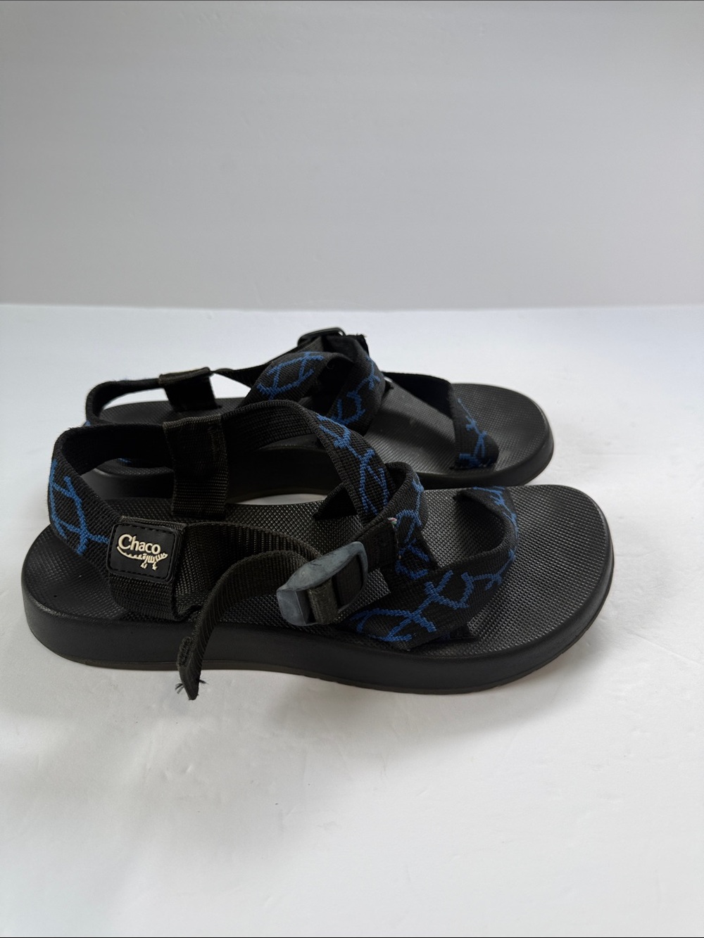 Chaco men’s Black Sandals with Blue Patterned Straps